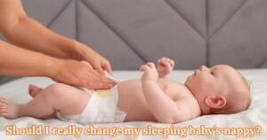 Should I really change my sleeping baby’s nappy?
